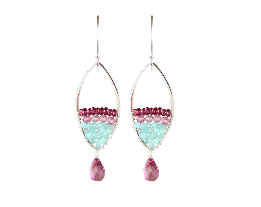 Sterling silver earrings with pink gemstones.