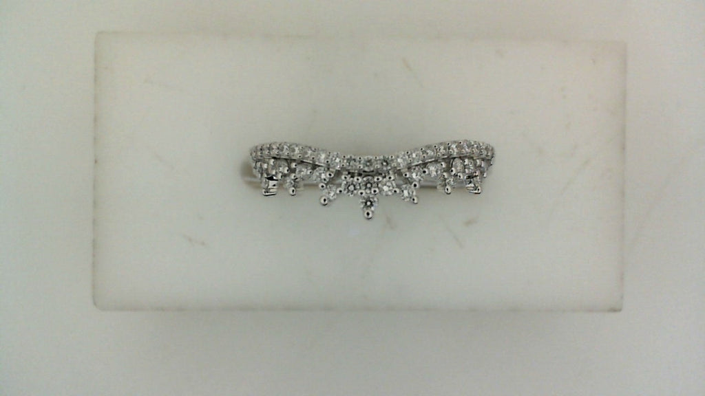 Contour wedding band with round diamonds.