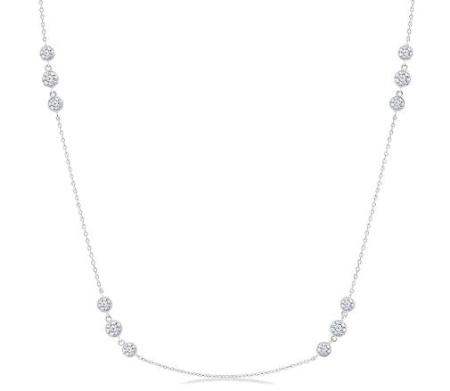 Diamond station necklace with round diamonds.