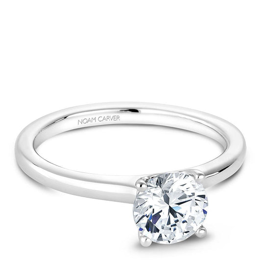 14K white gold solitaire engagement ring.