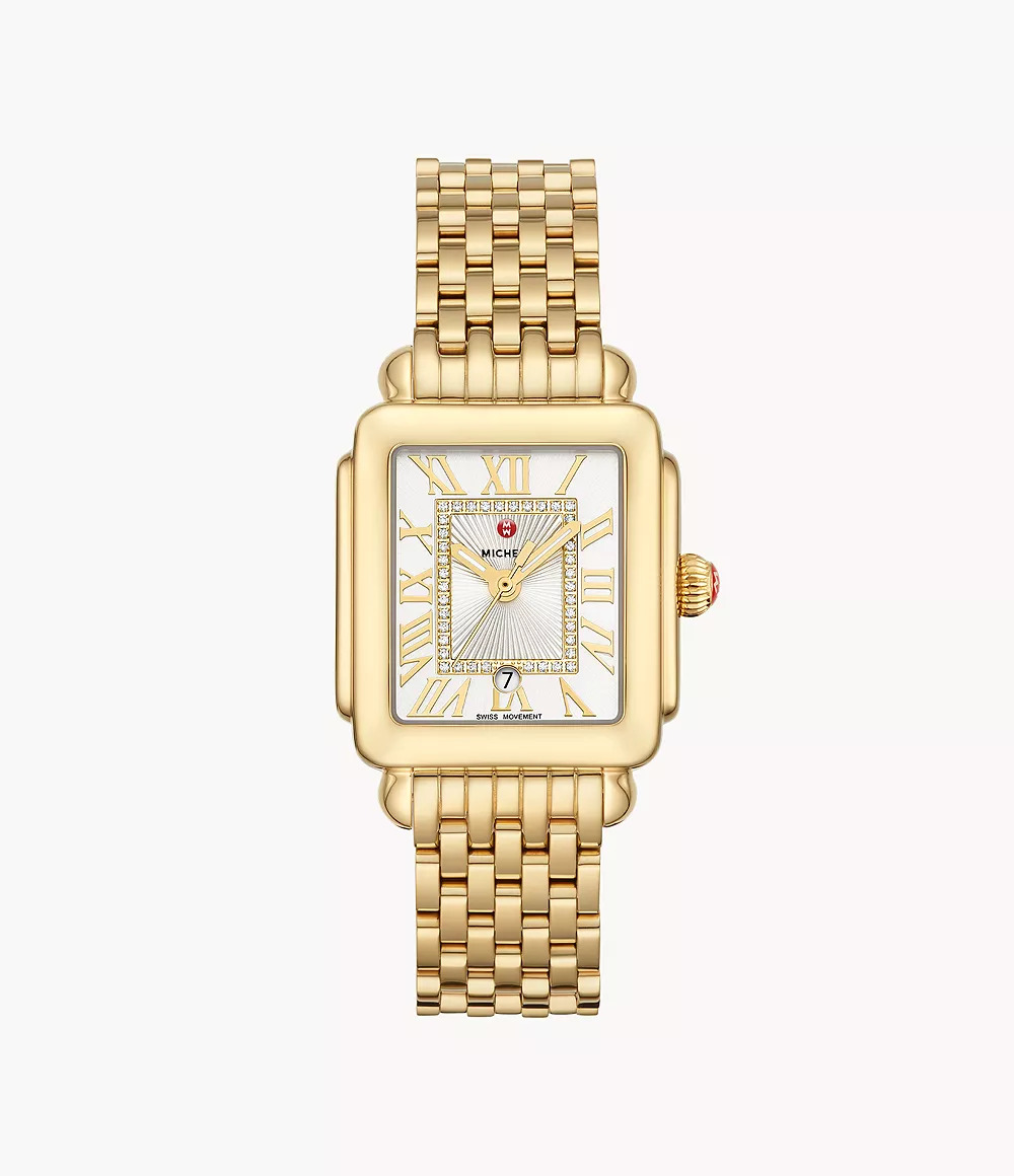 Gold-plated watch with diamond-accented bezel.