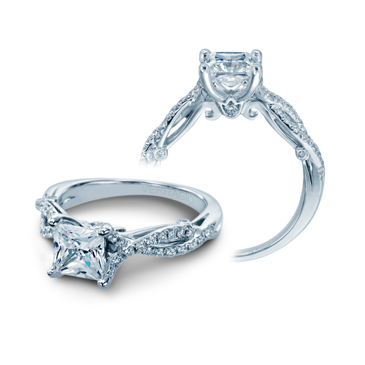 18K white gold ring with diamond accents.