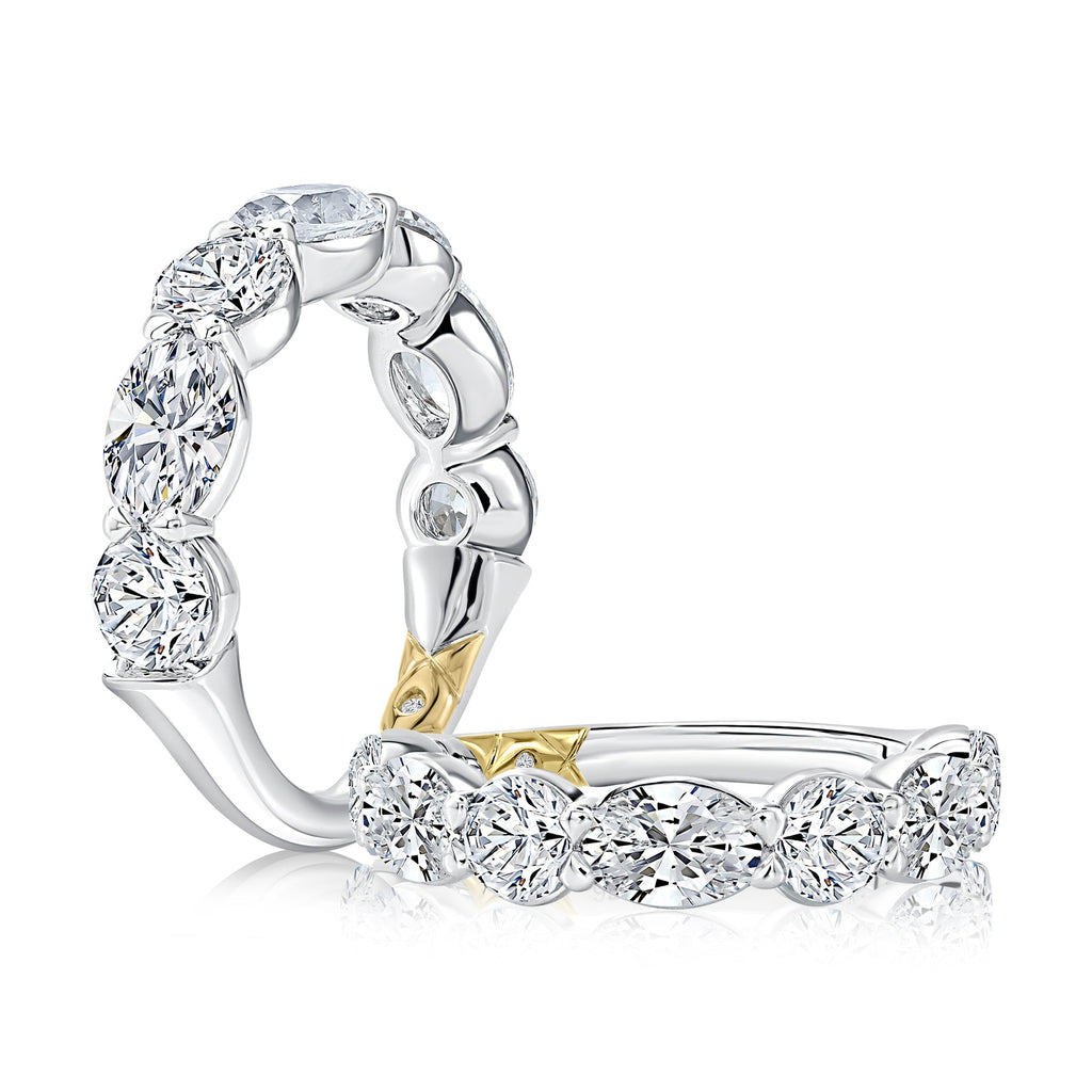 Oval and round diamond wedding band.