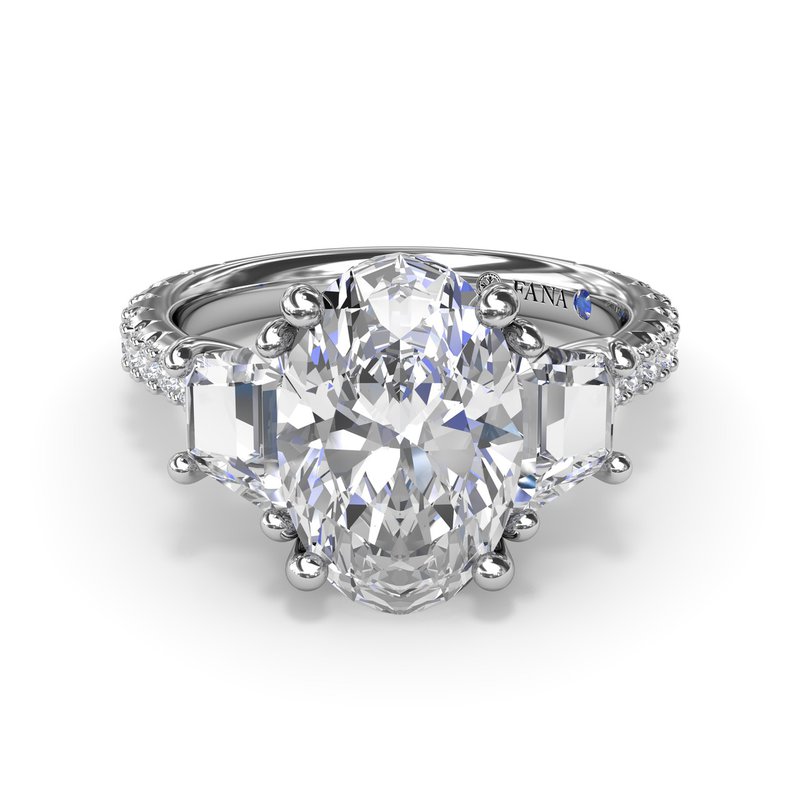 Three-stone diamond ring in white gold.