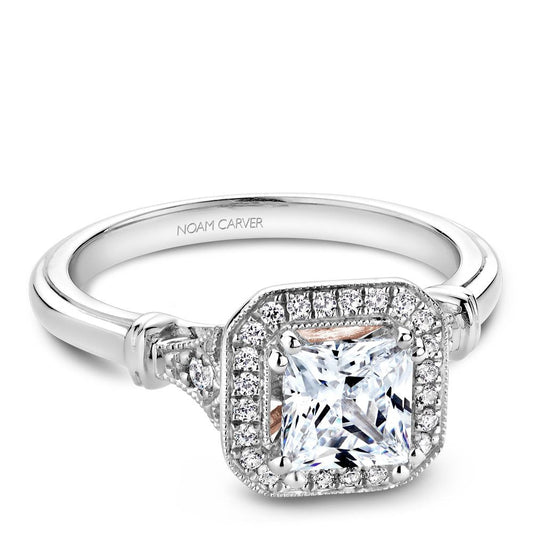 Halo vintage diamond ring in white gold.