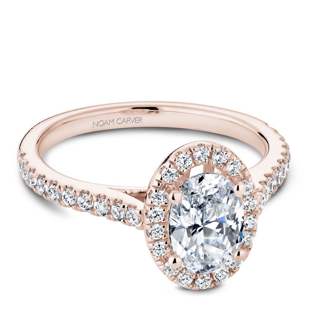 Rose gold diamond halo engagement ring.