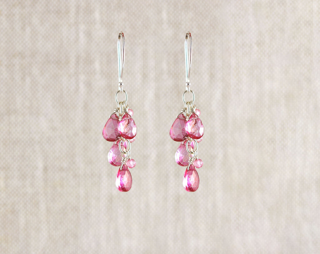 Sterling silver earrings with pink topaz drops.