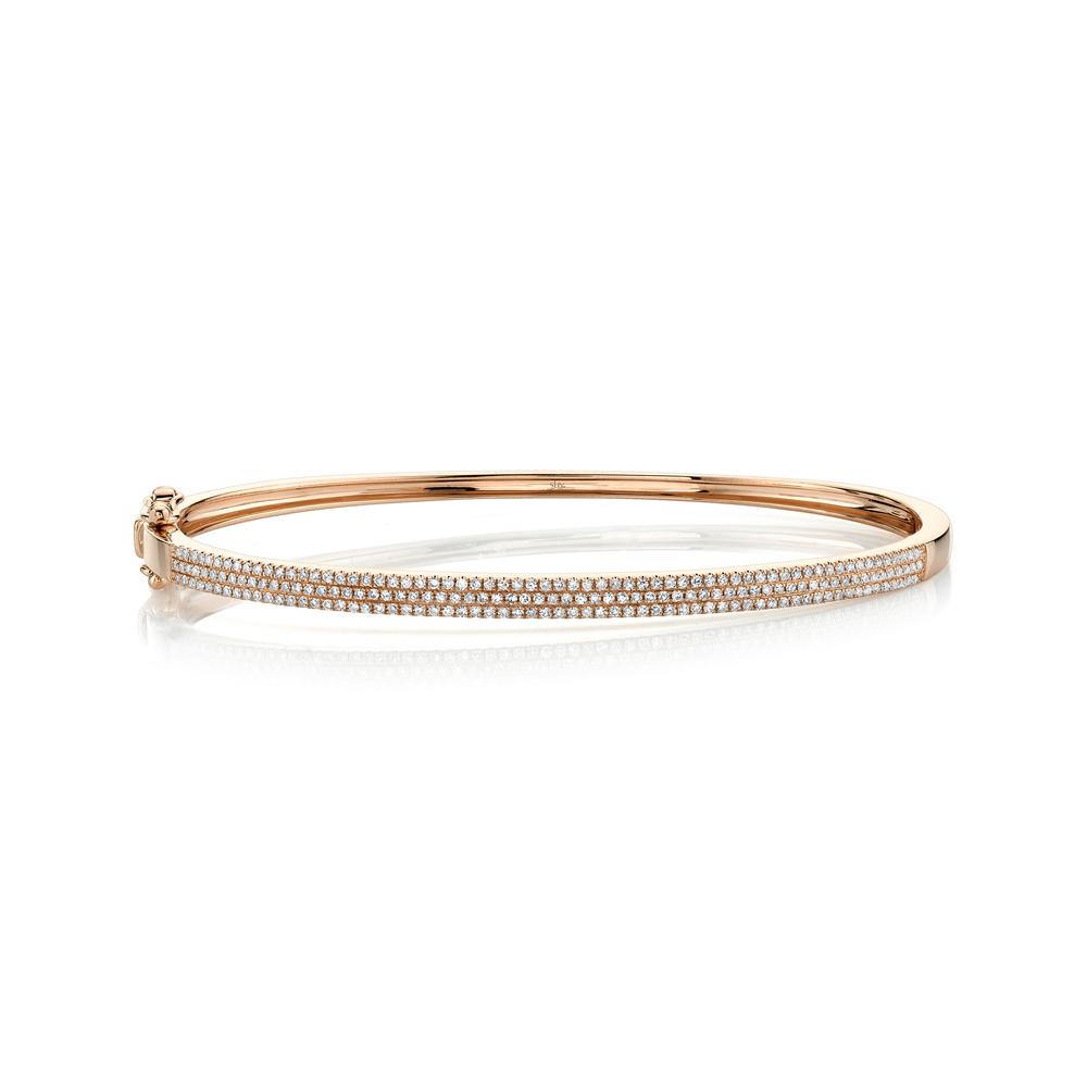 Rose gold diamond bracelet with dual rows.
