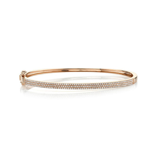 Rose gold diamond bracelet with dual rows.