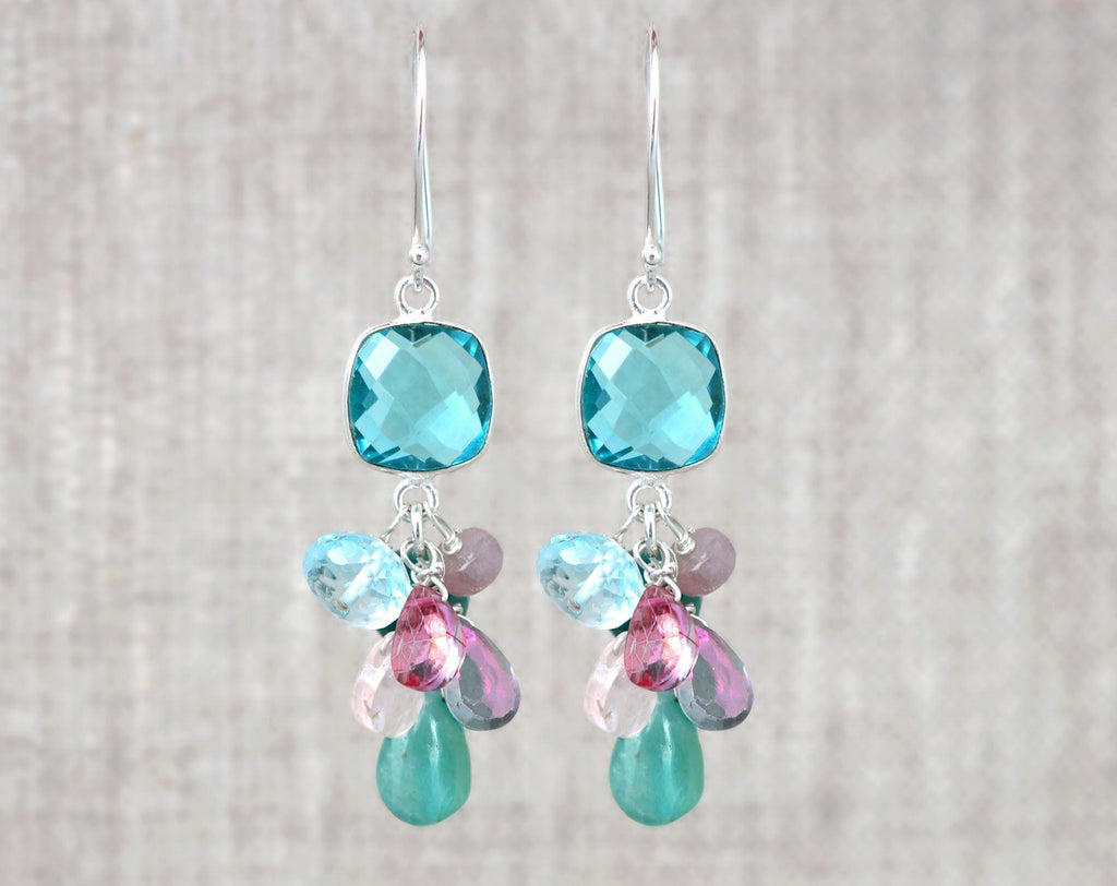Sterling silver earrings with colorful gemstones.