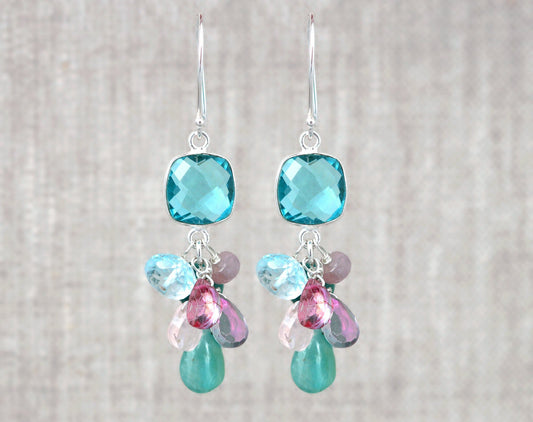 Sterling silver earrings with colorful gemstones.
