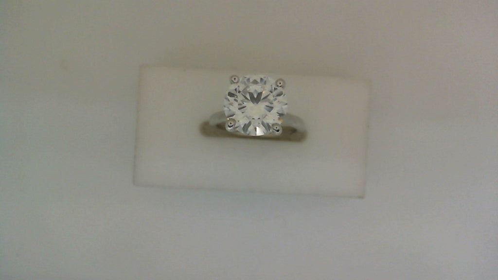 Solitaire lab-grown diamond ring in white gold.