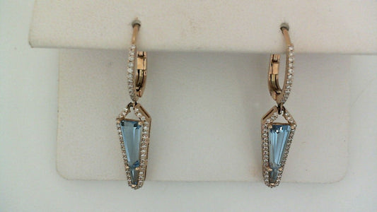 Blue topaz drop earrings with diamonds.