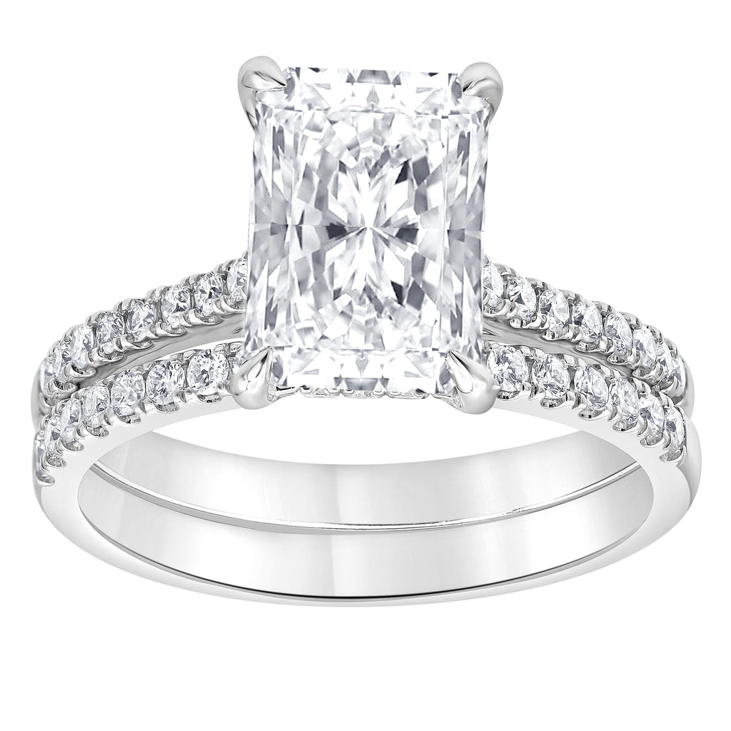 Radiant diamond engagement ring with accent stones.