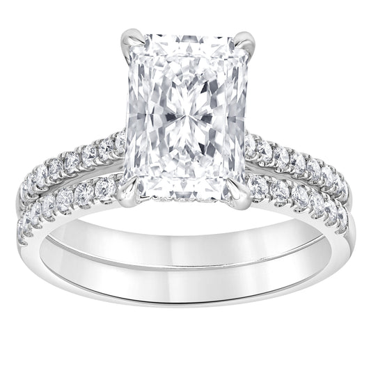 Radiant diamond engagement ring with accent stones.