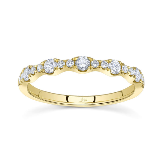 Yellow gold band with round diamonds.