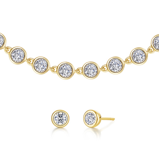 Yellow-finish simulated diamond earrings and bracelet.