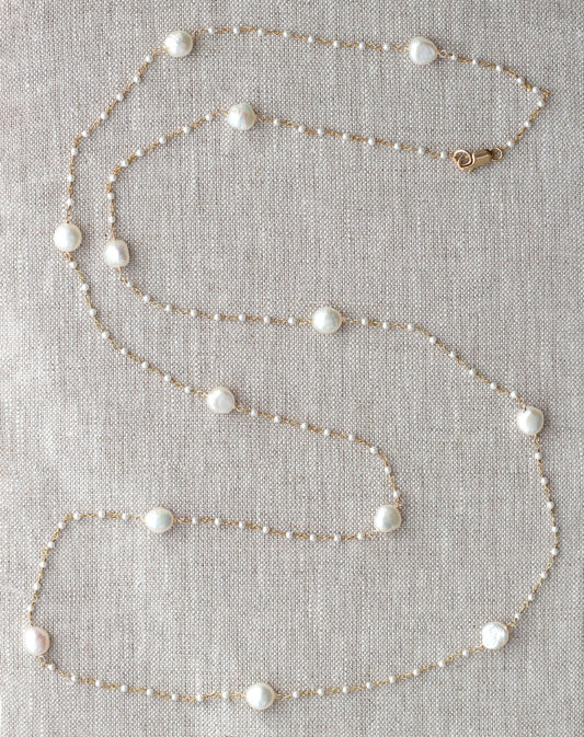 Gold-filled necklace with baroque white pearls.