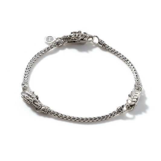 Sterling silver station bracelet with lobster clasp.