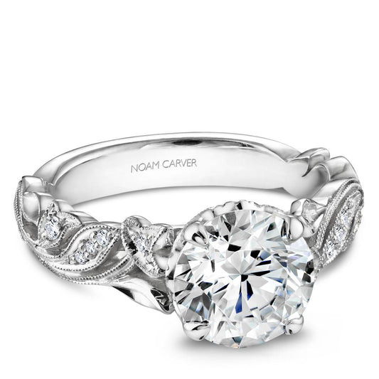 White gold ring with intricate diamond accents.
