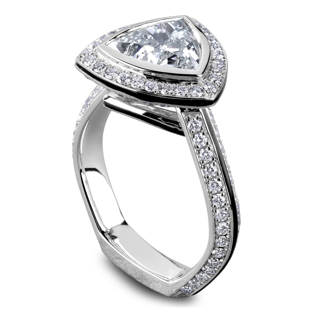 Trillion-cut diamond halo white gold ring.
