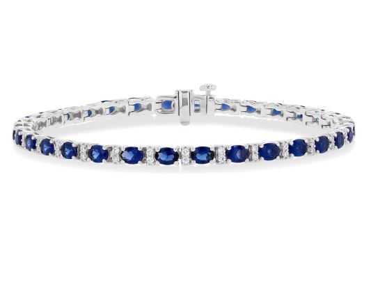 Oval sapphire and diamond station bracelet.