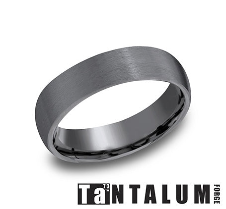 Dark grey tantalum men's carved band.