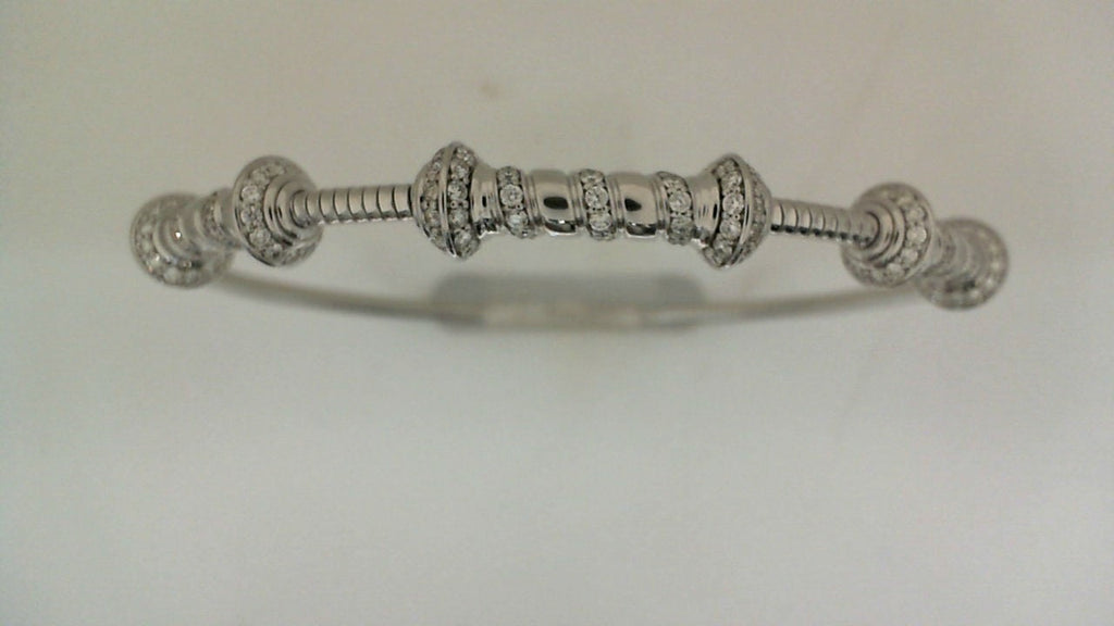 Diamond-studded white gold bracelet with round beads.