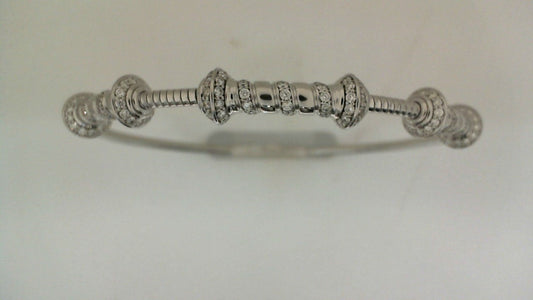 Diamond-studded white gold bracelet with round beads.