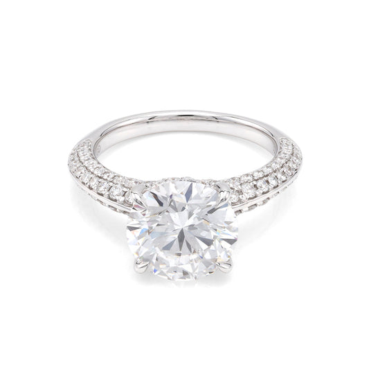 18K white gold ring with round diamonds.