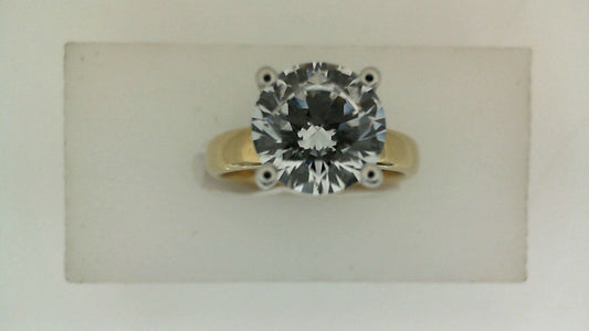 14K yellow gold ring with round diamond.