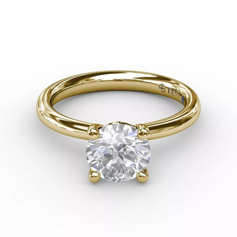 14K yellow gold solitaire engagement ring.