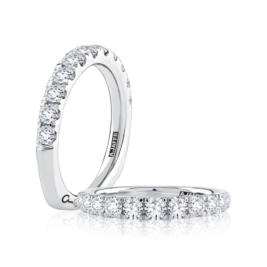 14K white gold band with round diamonds.