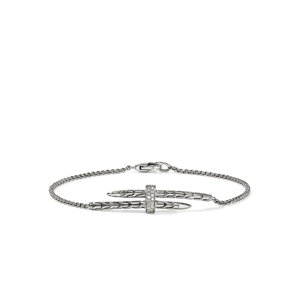 Sterling silver bracelet with round diamonds.