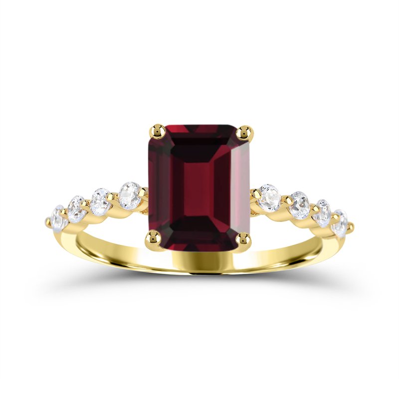 Emerald garnet ring with diamond accents.