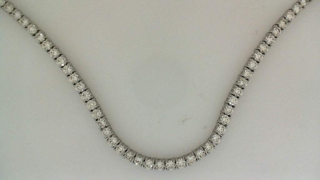 Round diamond tennis necklace in white gold.
