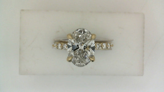 ReMARKable Designs Side Stone Lab-Grown Diamond Complete Engagement Ring in 14 Karat Yellow Gold with 2.09ct Oval Center Lab-Grown Diamond, Color: F, Clarity: VS2