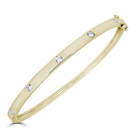14K yellow gold bracelet with round diamonds.