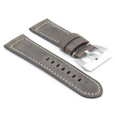 Blue leather watch band with tang buckle.