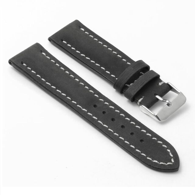 Black leather watch band, white stitching, tang buckle.