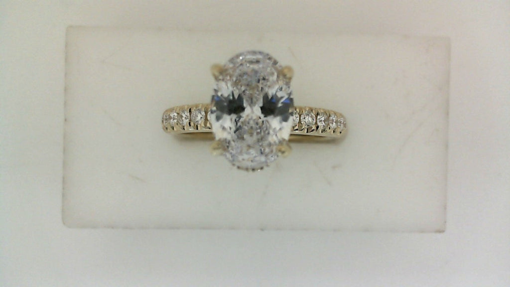 14K white gold ring with round diamonds.