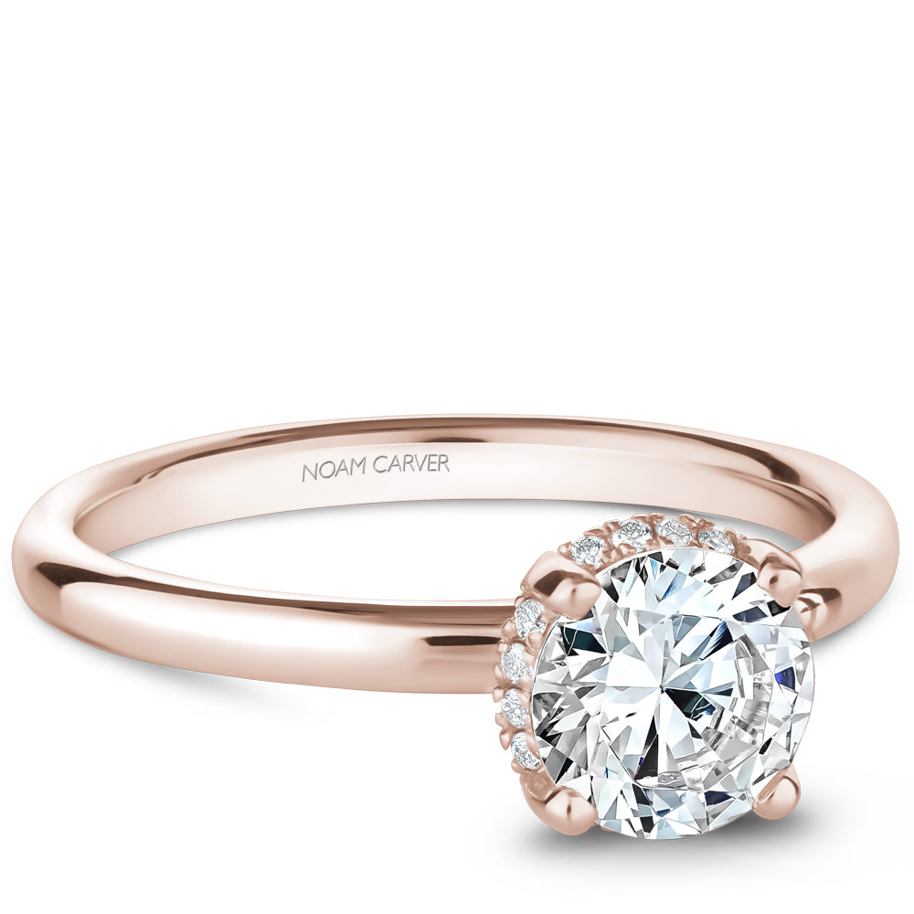 Rose gold ring with hidden accent diamonds.