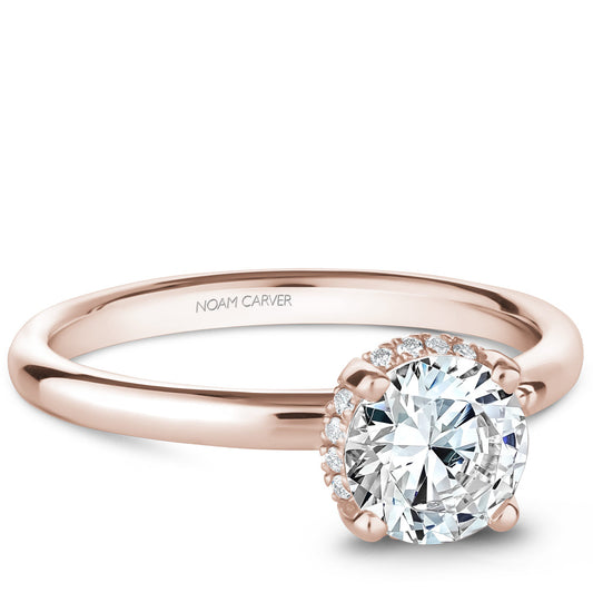 Rose gold ring with hidden accent diamonds.