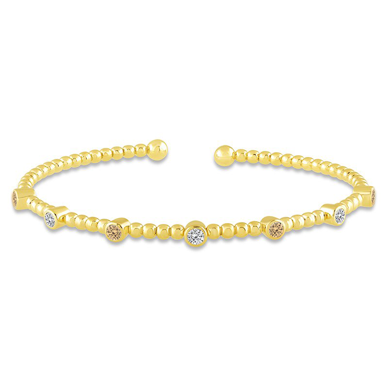 14K gold bangle with champagne diamonds.
