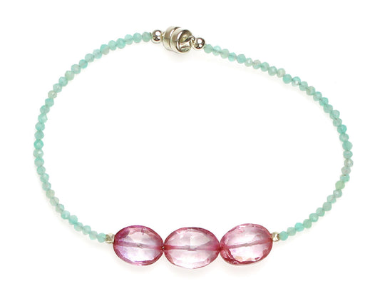 Sterling silver bracelet with pink topazes.
