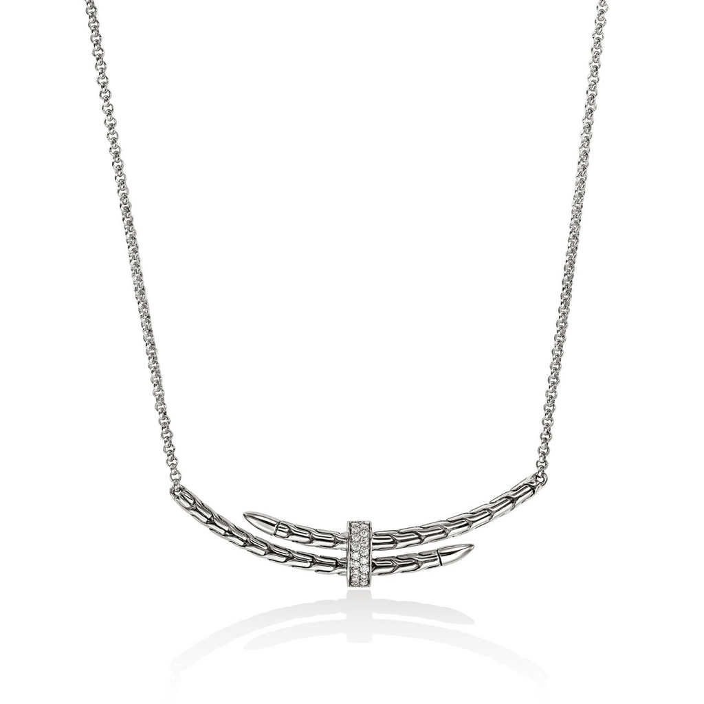 Sterling silver necklace with diamond accents.