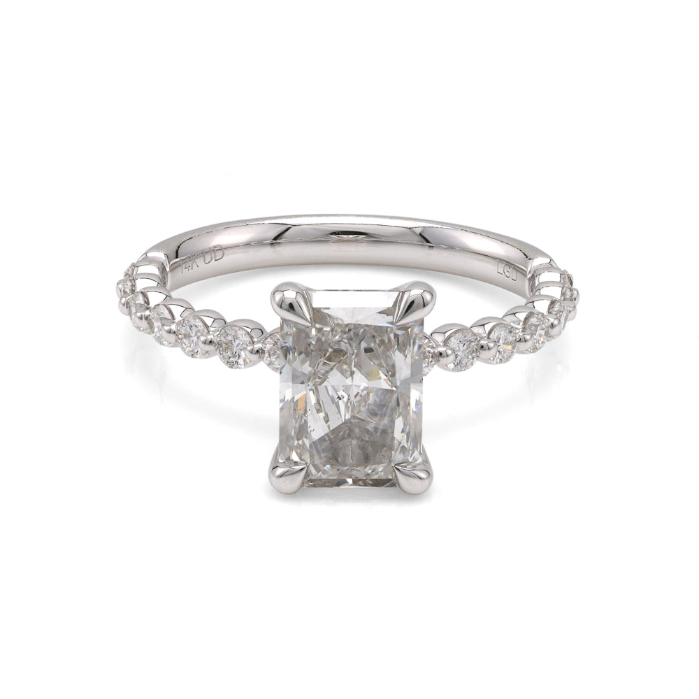 Radiant lab-grown diamond engagement ring.