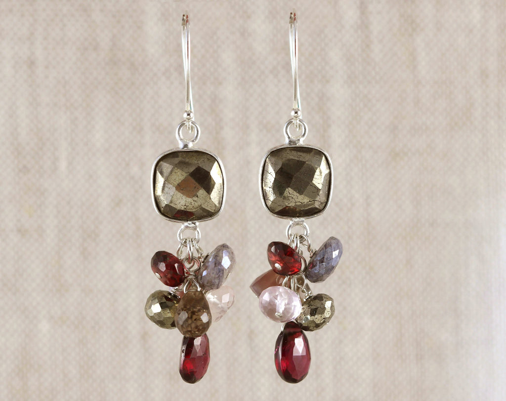 Sterling silver earrings with multicolored gemstones.