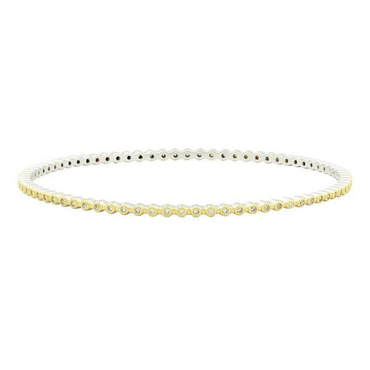 Yellow-grey bangle with cubic zirconia accents.