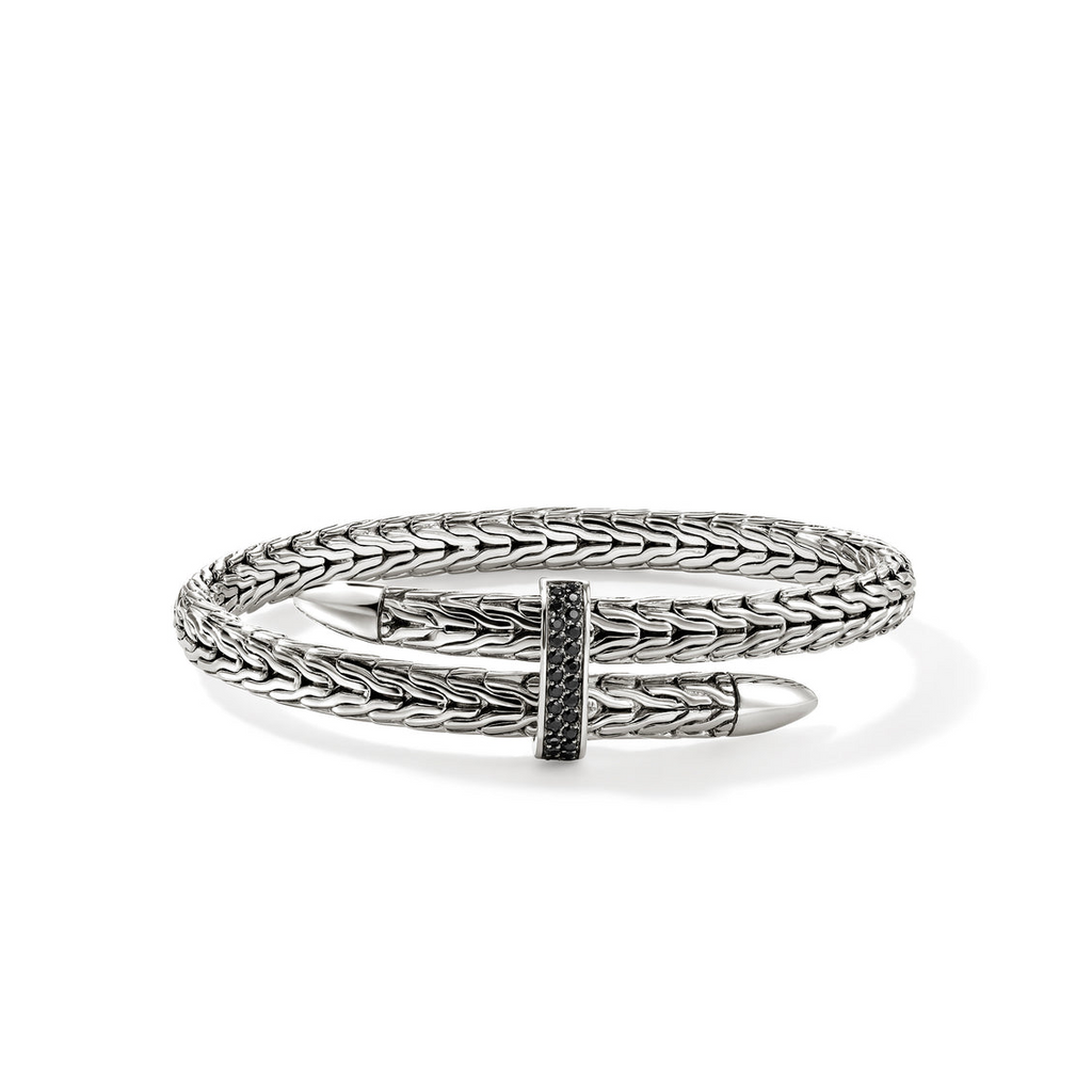 Sterling silver bangle with black sapphires.